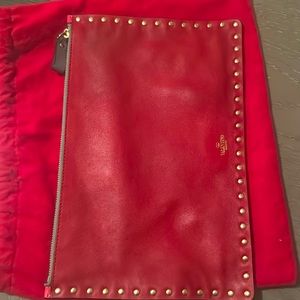 Valentino, pink and red clutch stud like brand new Carrie twice with a dusterl